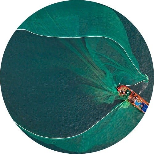 fishing boat with net in water