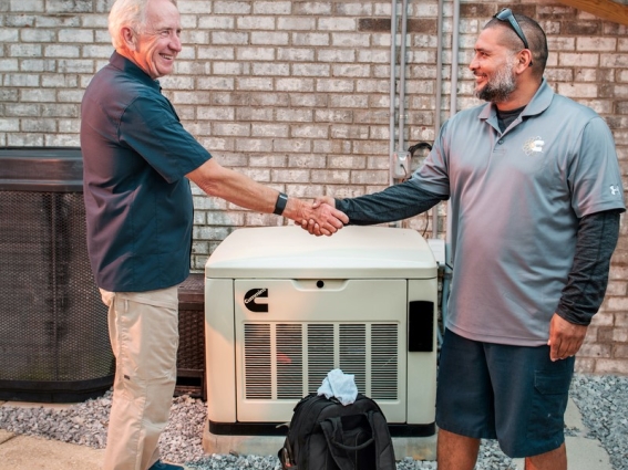 generator technician helping customer